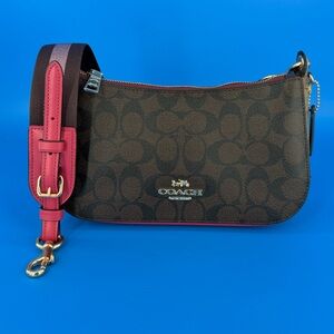 Coach Jes Baguette in Signature Coated Canvas. COA